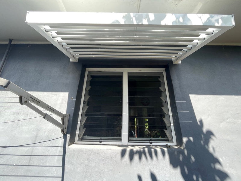 Load image into Gallery viewer, white tilt louvre awning showing shade protection