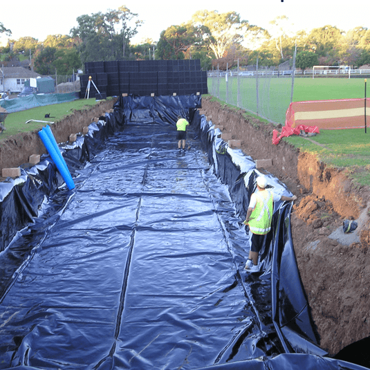 Plastic liner laid down for detention tank