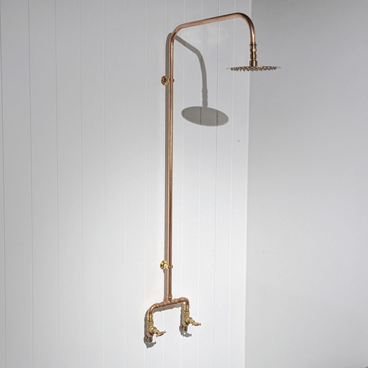 two tap rounded spot shower with brass clips and head