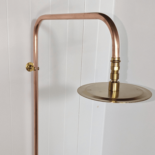 Rounded spot style copper and brass shower